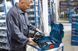 Набір акумуляторних інструментів Bosch Professional: дриль-шурупокрут GSR 18V-65, перфоратор GBH 18V-22, КШМ GWS 18V-8 з 2 акб GBA 18V 5.0 Ah і з/п GAL 18V-40 в 3 кейсах L-BOXX 136
